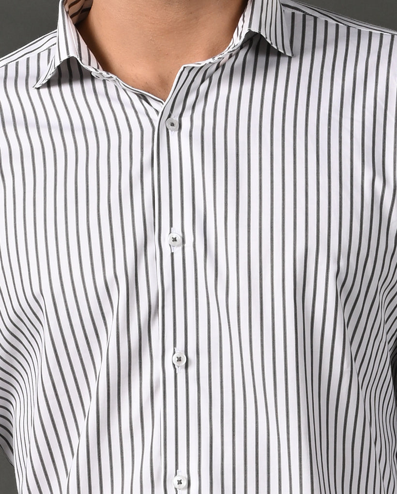 Close-up of a black and white striped shirt with a collar.