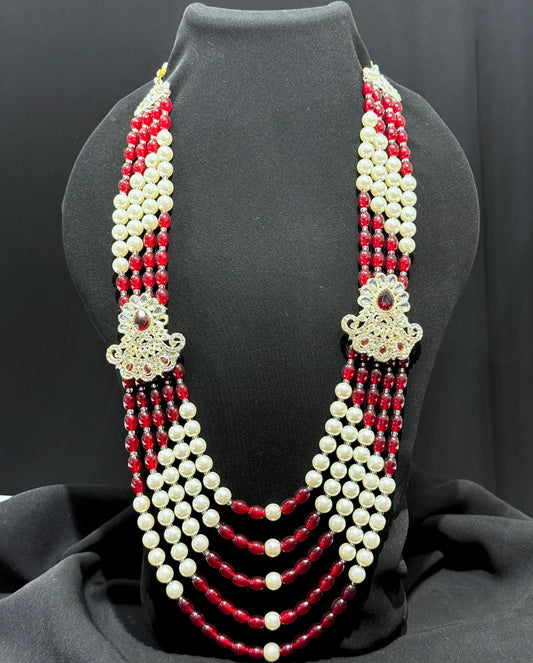 sherwani mala with red and cream beads for groom
traditional sherwani mala with kundan brooches
wedding sherwani mala for dulha
royal sherwani mala for groom look