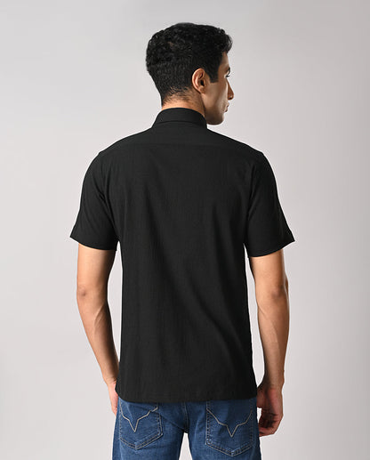 Men's black slim fit shirt with apple cut hem and pocket-free front — perfect for party or casual wear