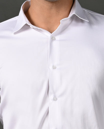 Close-up of a white dress shirt with collar and buttons on a gray background