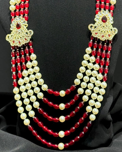 sherwani mala with red and cream beads for groom
traditional sherwani mala with kundan brooches
wedding sherwani mala for dulha
royal sherwani mala for groom look