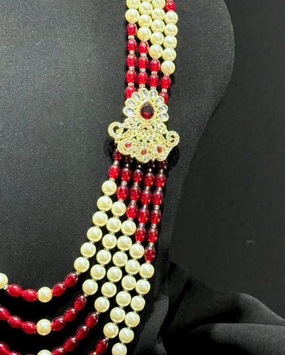 sherwani mala with red and cream beads for groom
traditional sherwani mala with kundan brooches
wedding sherwani mala for dulha
royal sherwani mala for groom look
